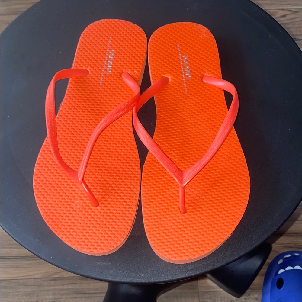 Bright Orange Flip Flops